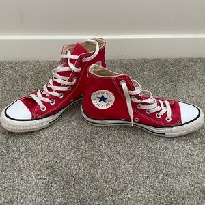 Red converse high tops